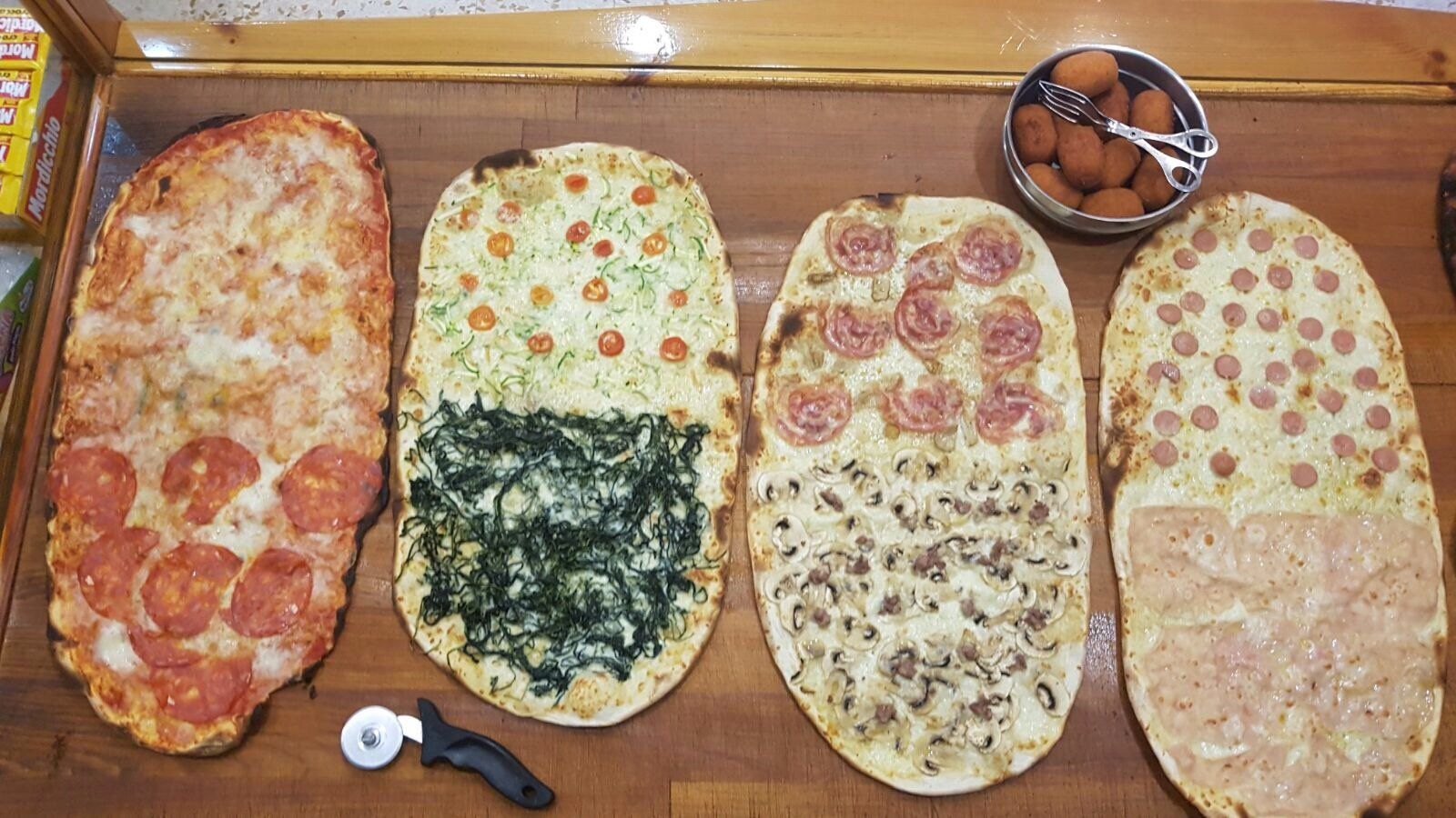 pizza condita con vari gusti