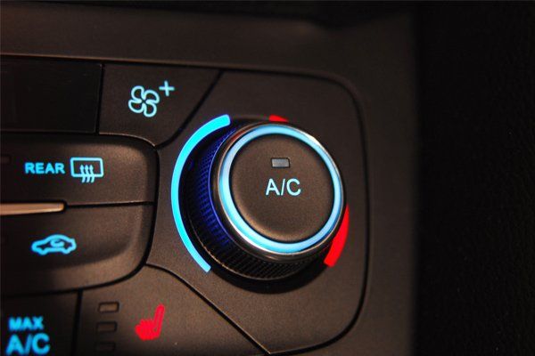 close up of ac knob on car dash