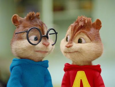 Two chipmunks: one in a blue hoodie with glasses, the other in a red hoodie. They are side by side, both looking slightly off-camera.