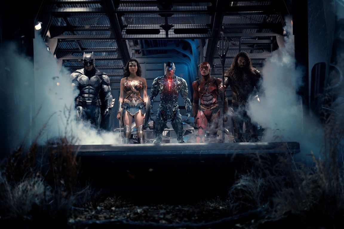 The Justice League: Batman, Wonder Woman, Cyborg, Flash, and Aquaman stand together, ready for battle.