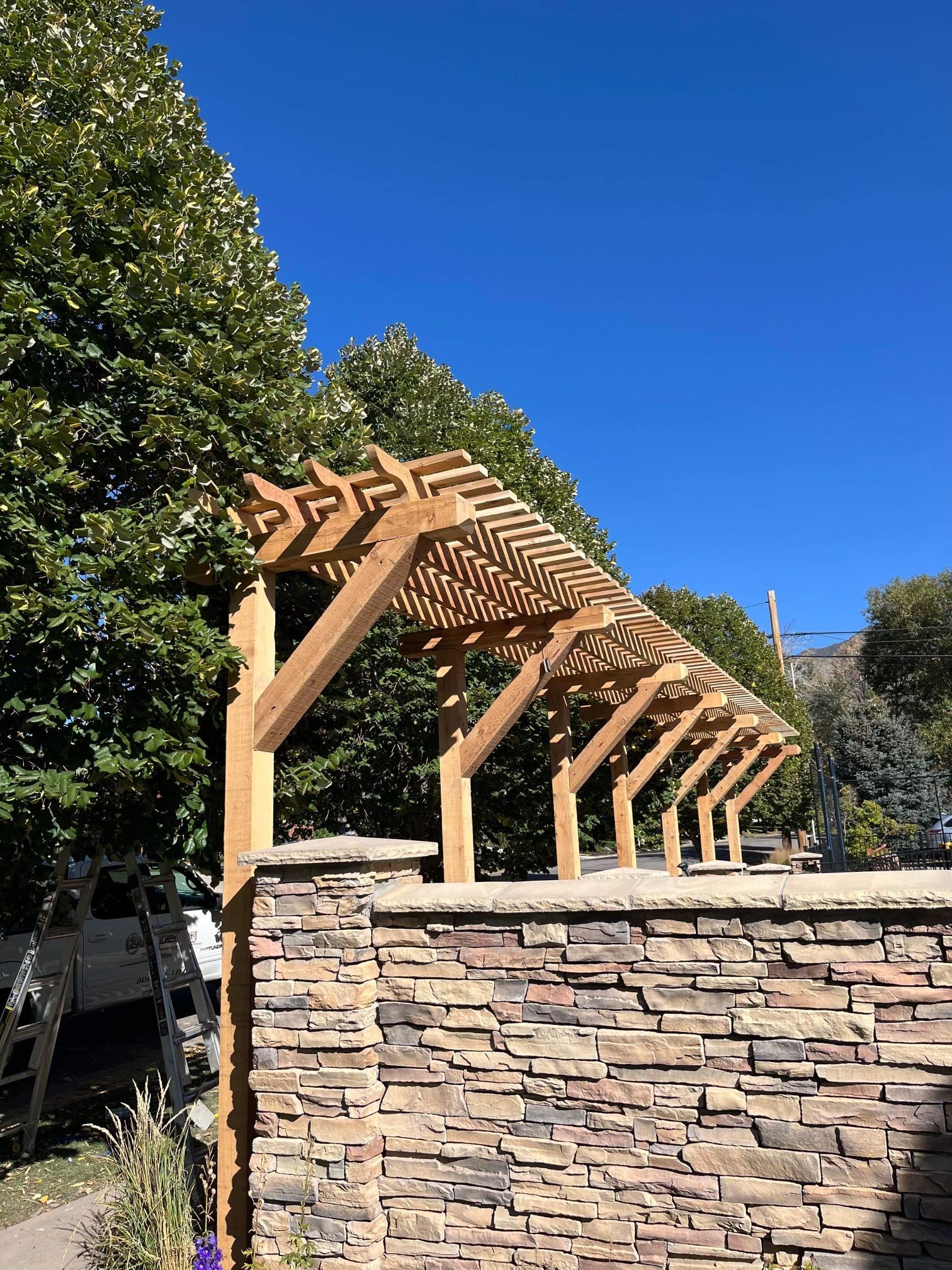 A house is being built with a lot of wooden beams.