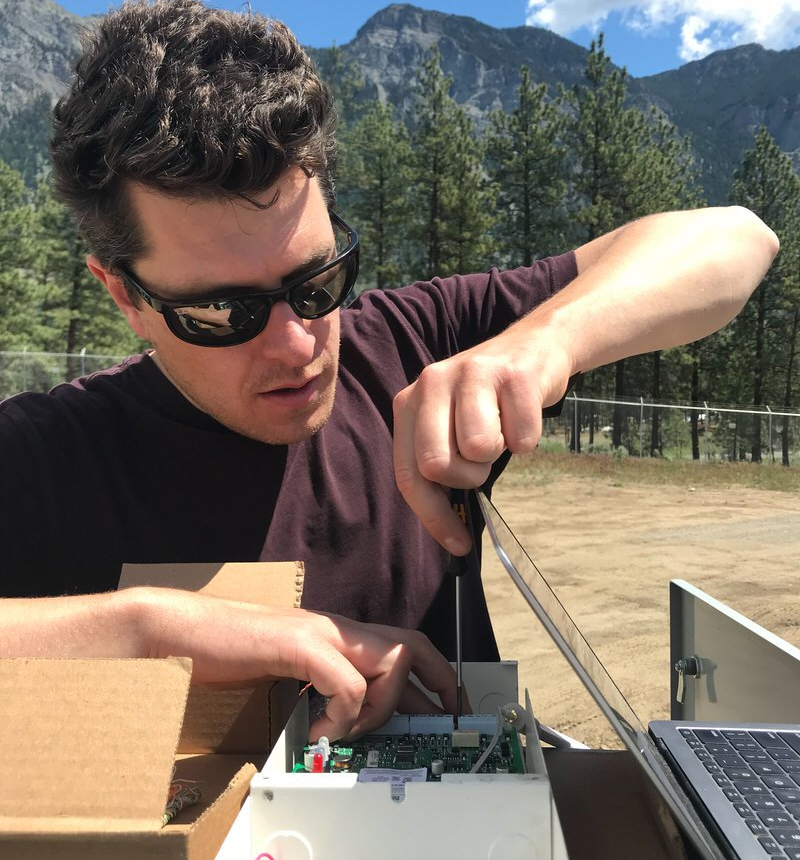 Dan Tobias installing the cannabis security eletronics.