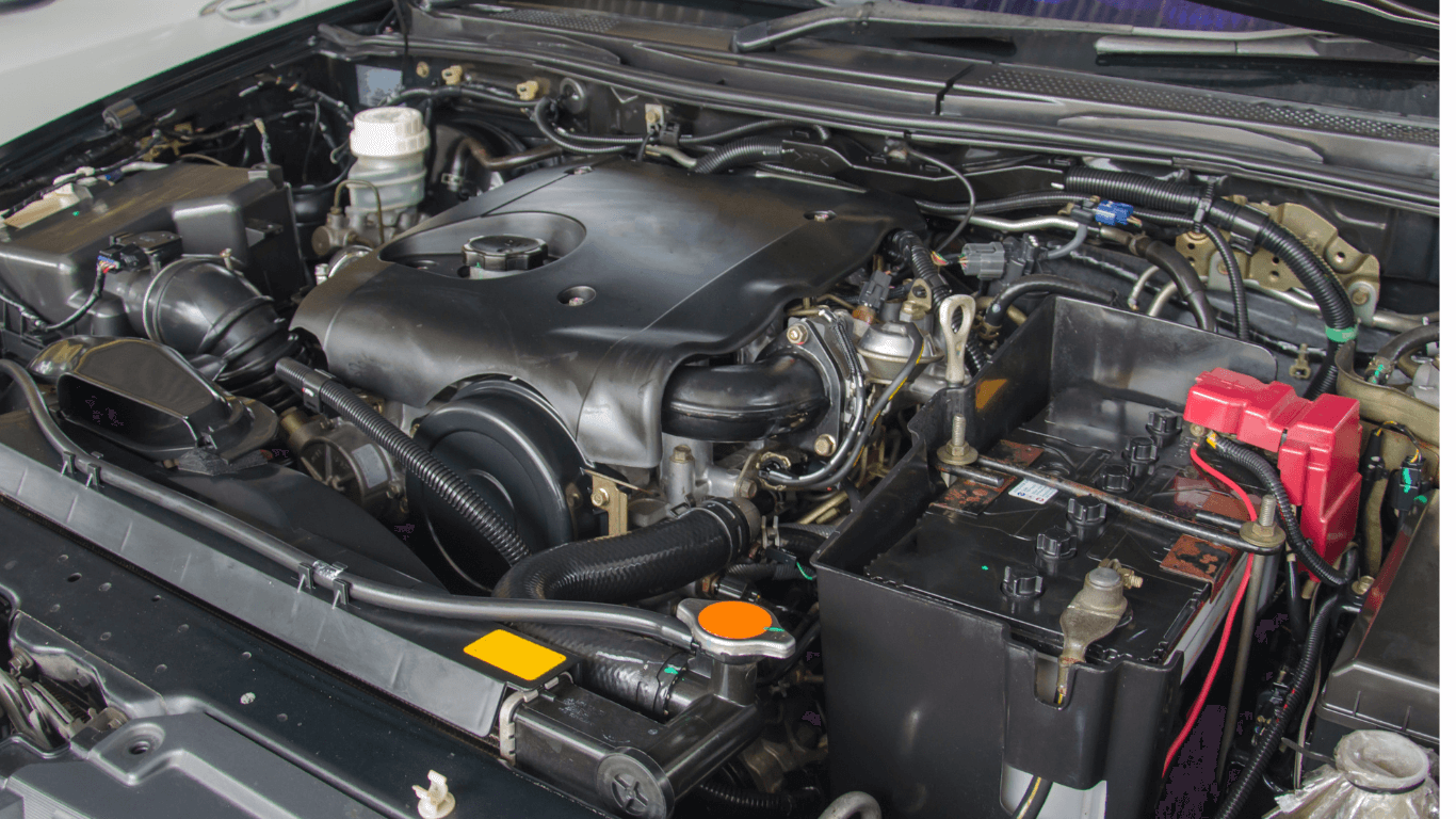mechanic under the hood of a car
