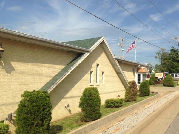 Exterior view from side of Allee-Holman-Howe Funeral Home in Camdenton, MO