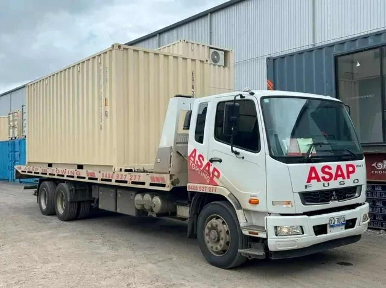 White Truck With a Beige Shipping Container — ASAP Towing Pty Ltd In Gympie, QLD
