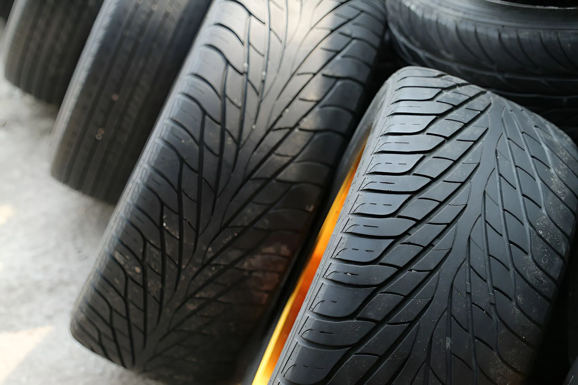 A Stack of Black Car Tires With Tread Patterns — ASAP Towing Pty Ltd In Gympie, QLD