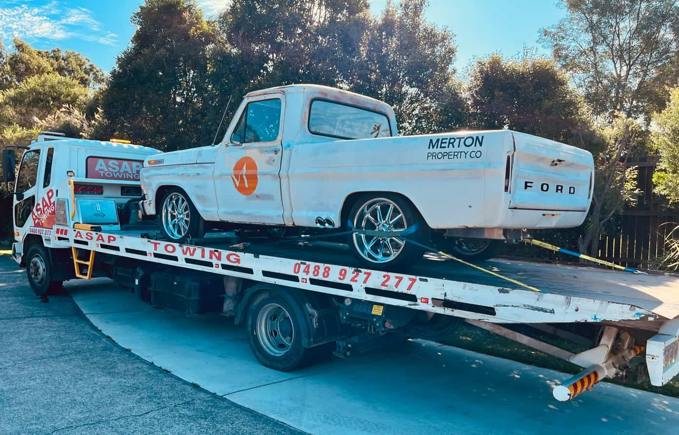 White Classic Ford Truck Loaded on a Tow Truck — ASAP Towing Pty Ltd In Tiaro, QLD