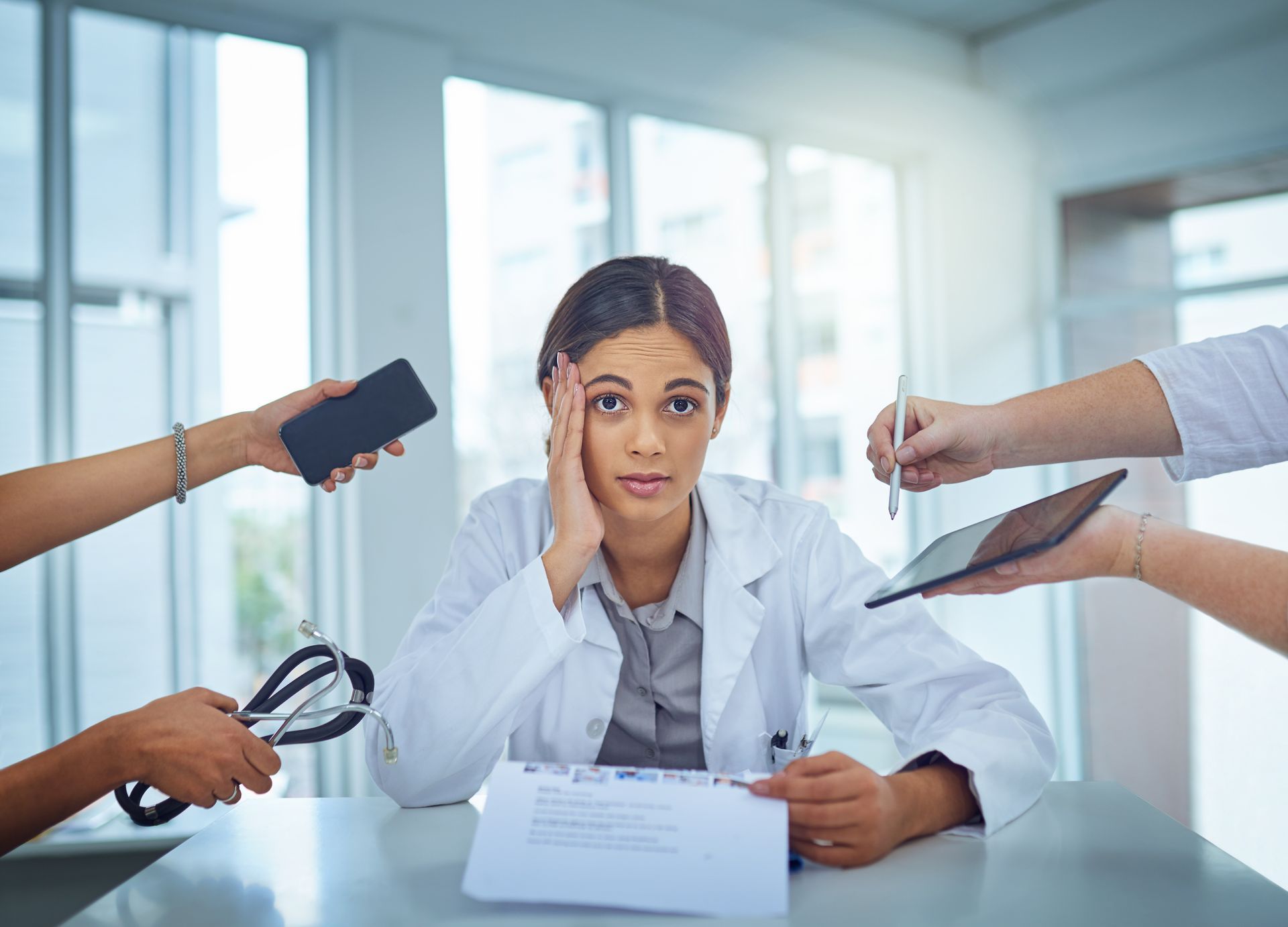 Doctor with hands reaching towards her