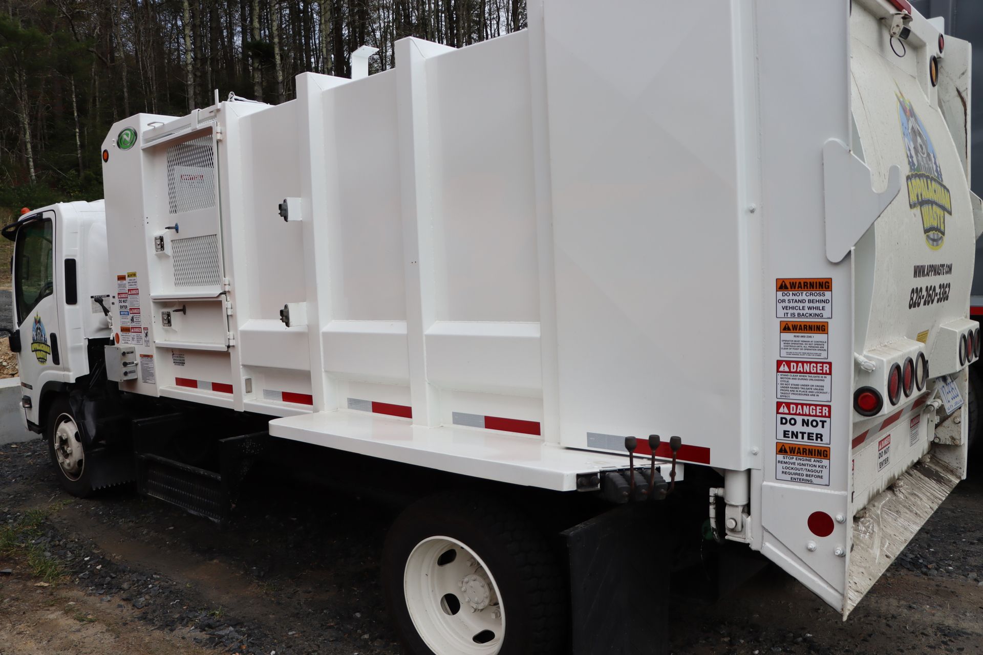 White Mamba garbage truck- Appalachian Waste Management (828) 260-3362