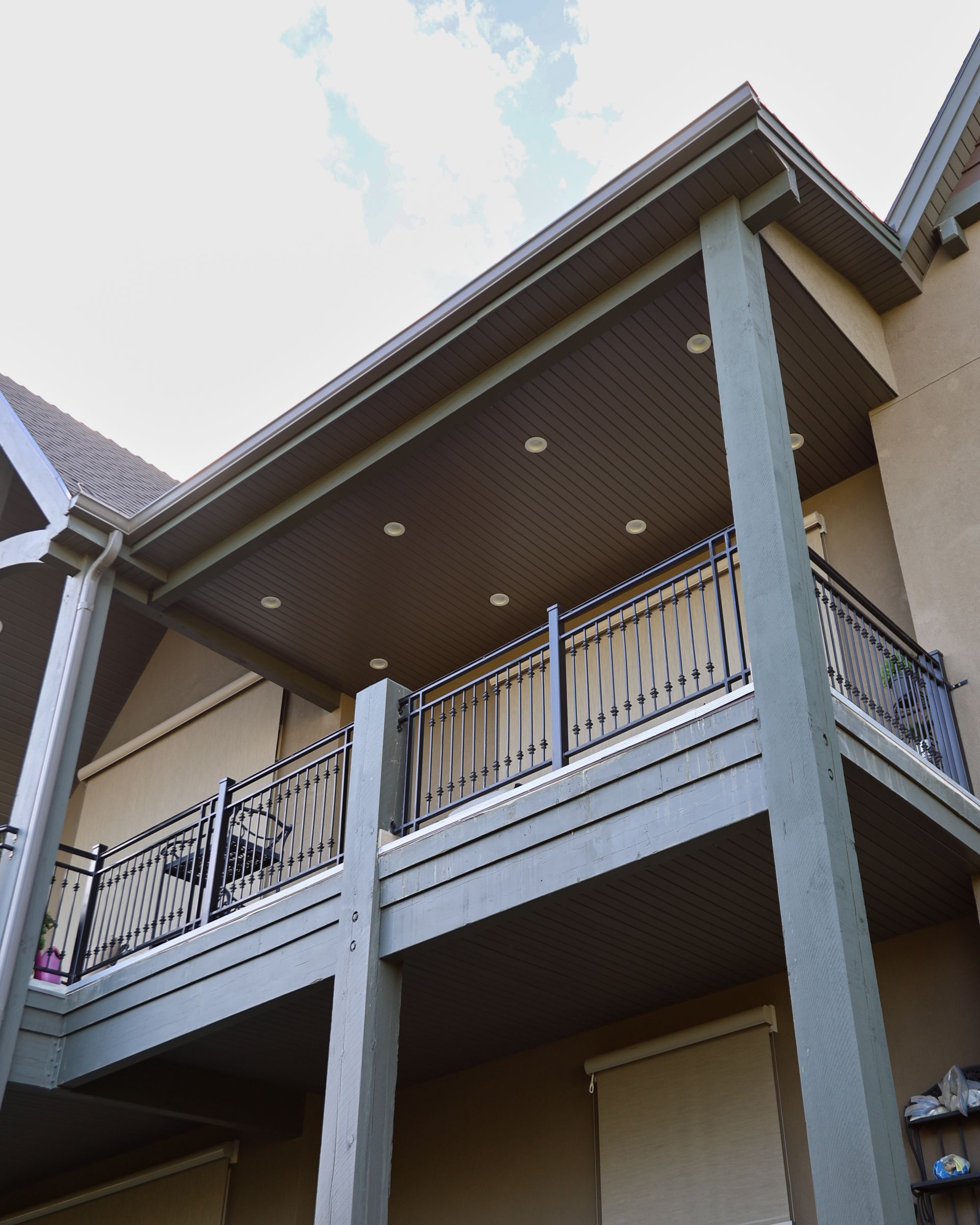 A large house with a balcony on the second floor