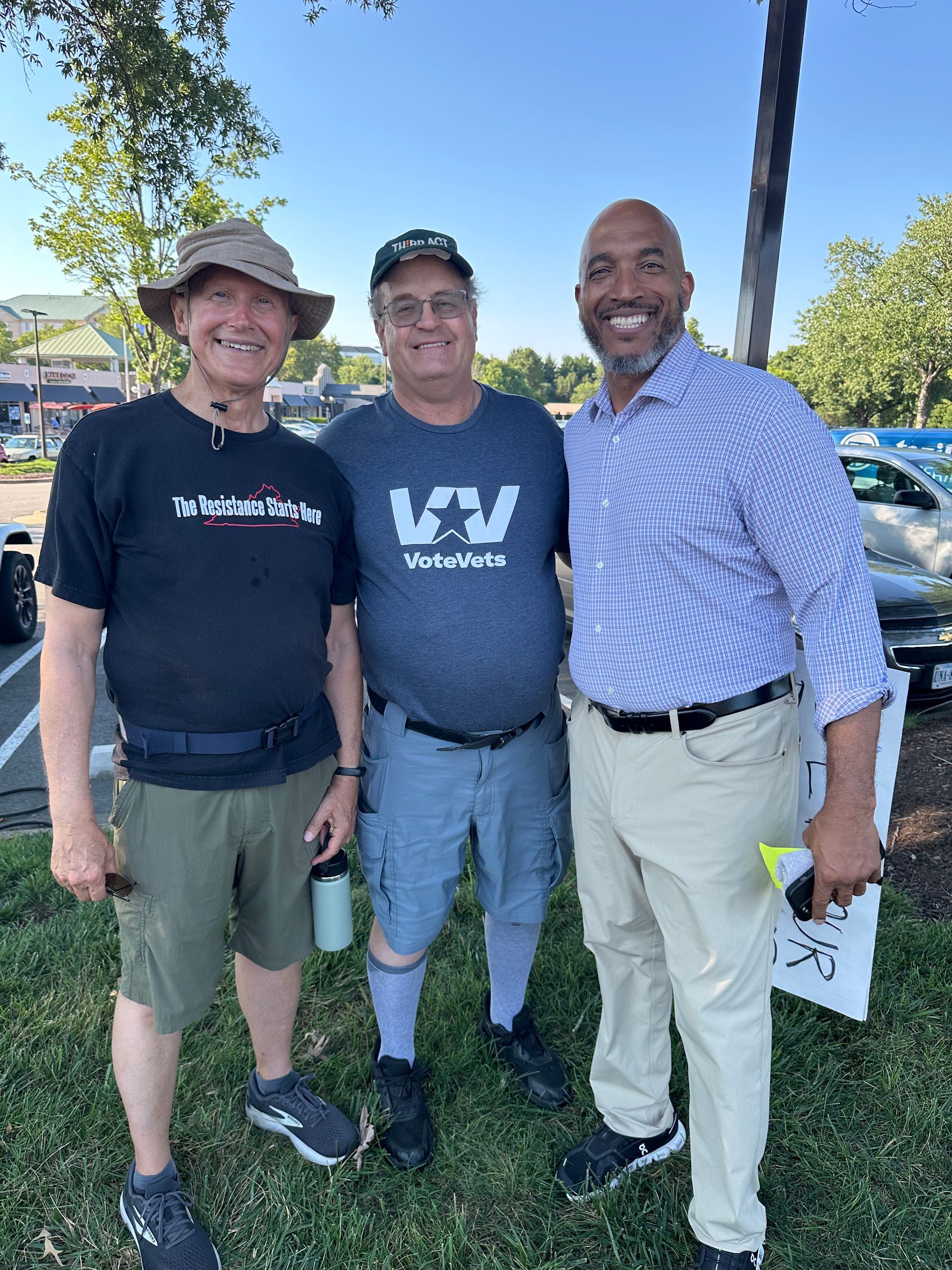 American flag with red and white stripes and a blue field of white stars.
