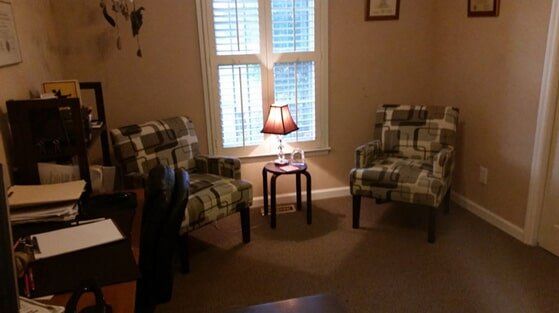 Office interior with chairs by window - counseling services - New Day Counseling Center, Inc., PC in Fayetteville, NC