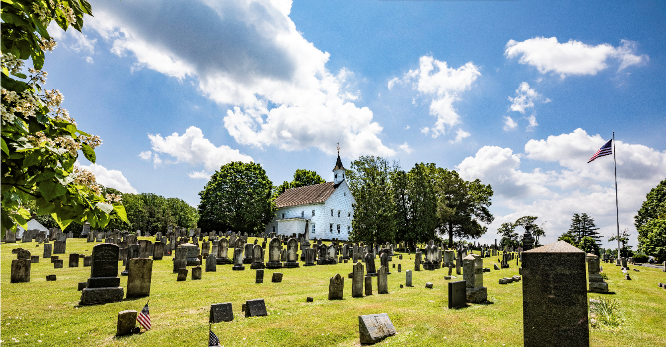 Funeral Planning — Family At A Burial in Tennent, NJ