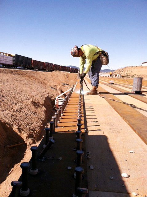 field stud welding, jobsite stud welding, jsw stud rails, embeds, psr rails, punching shear connectors, punching shear rails