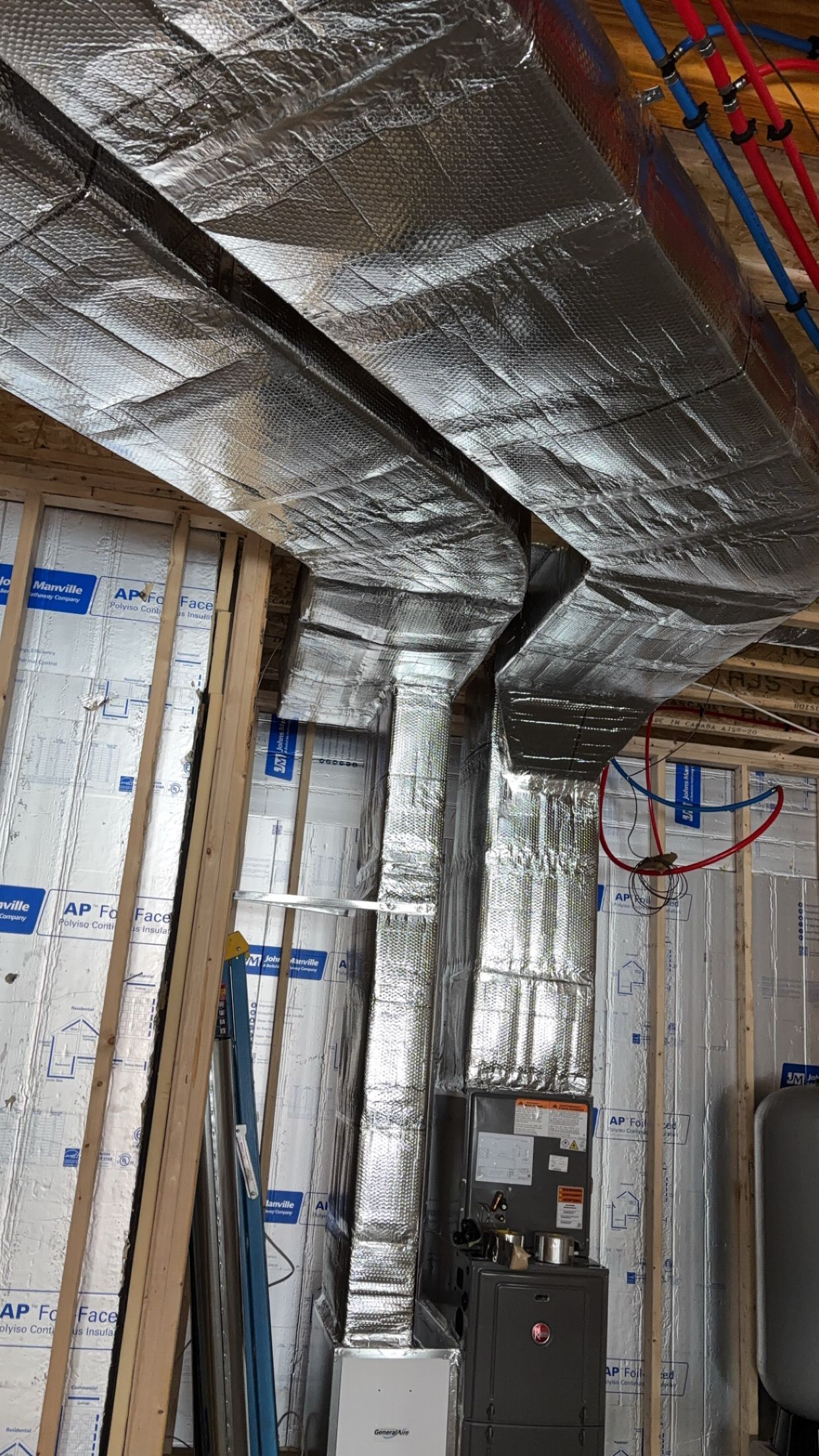 Interior of a modern, open space with concrete pillars and a polished floor, exposed ductwork. Interior of a modern, open space with concrete pillars and a polished floor, exposed ductwork.