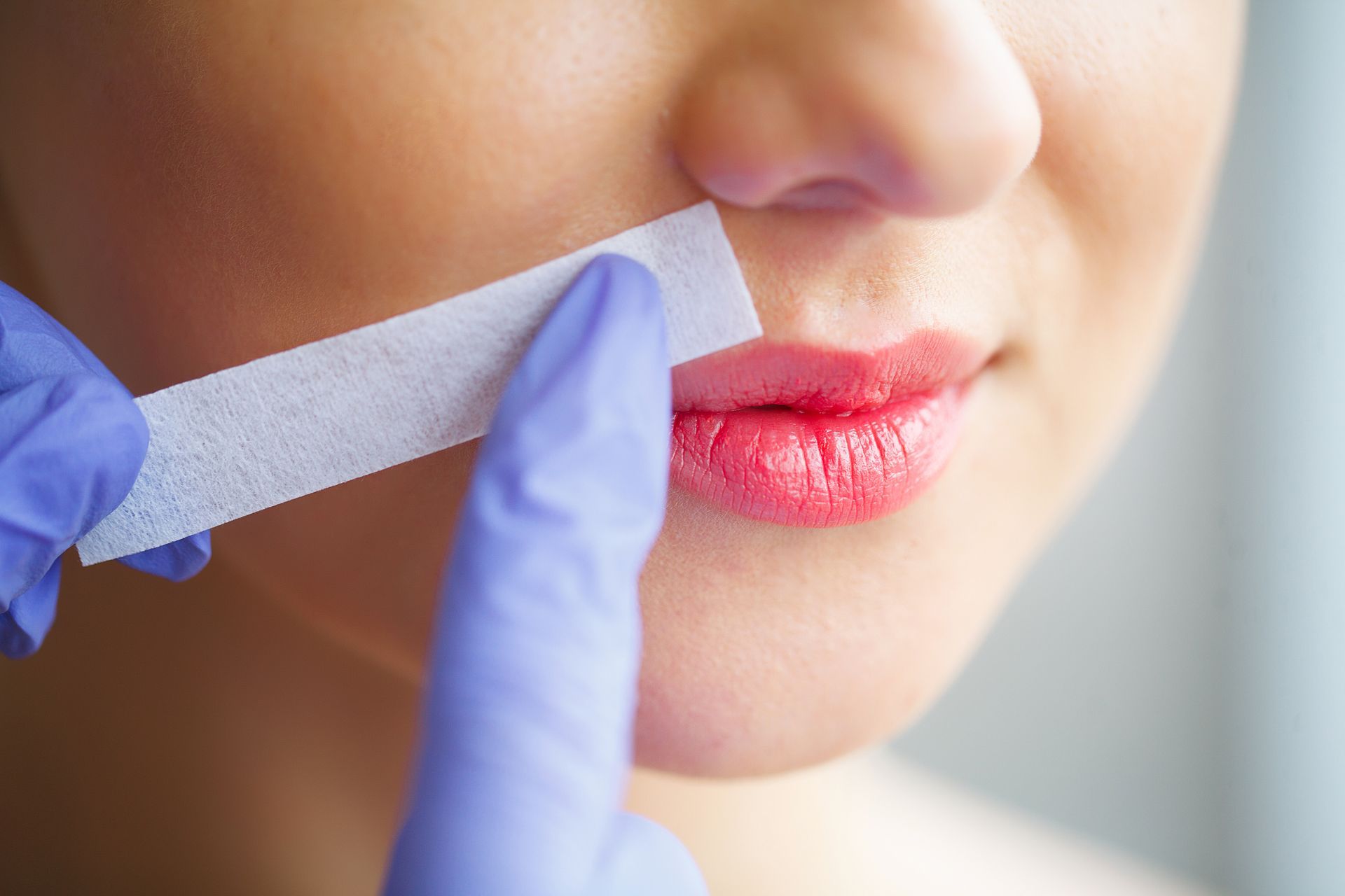 closeup of upper lip waxing treatment