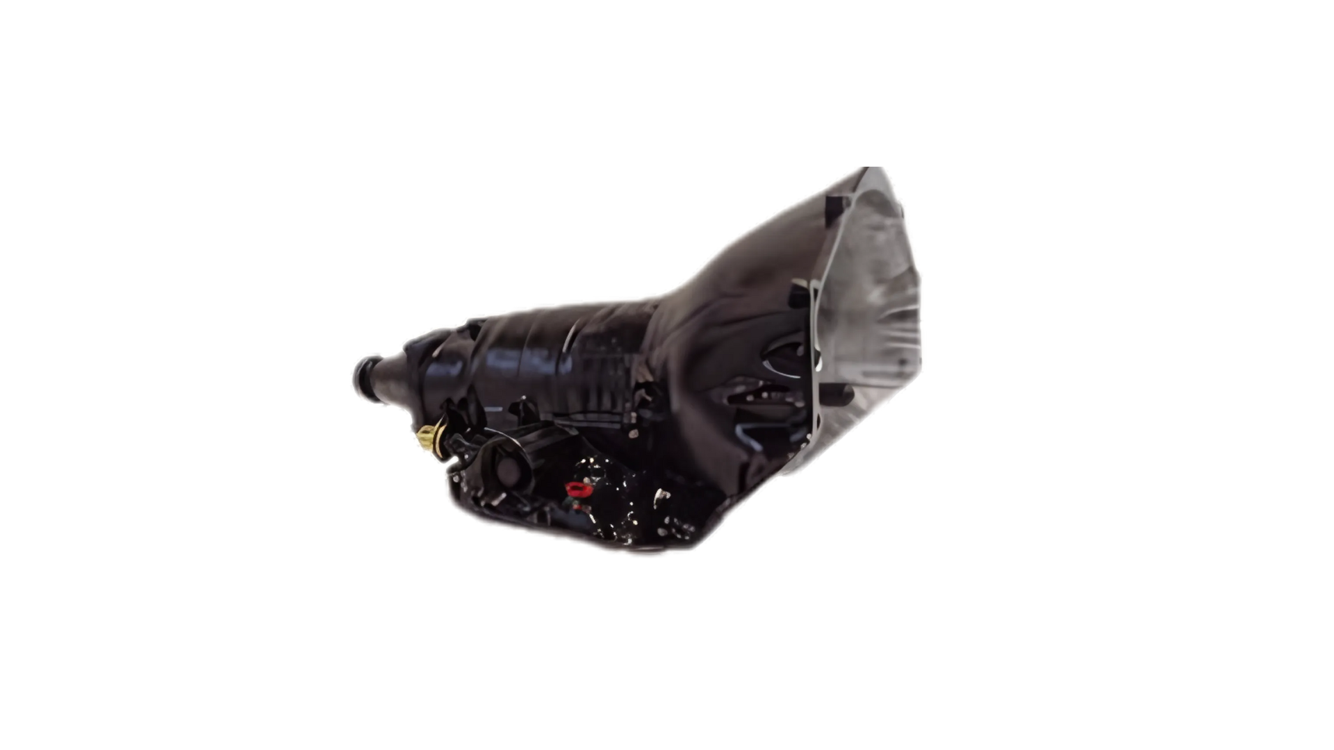 A close up of a black gearbox on a white background.