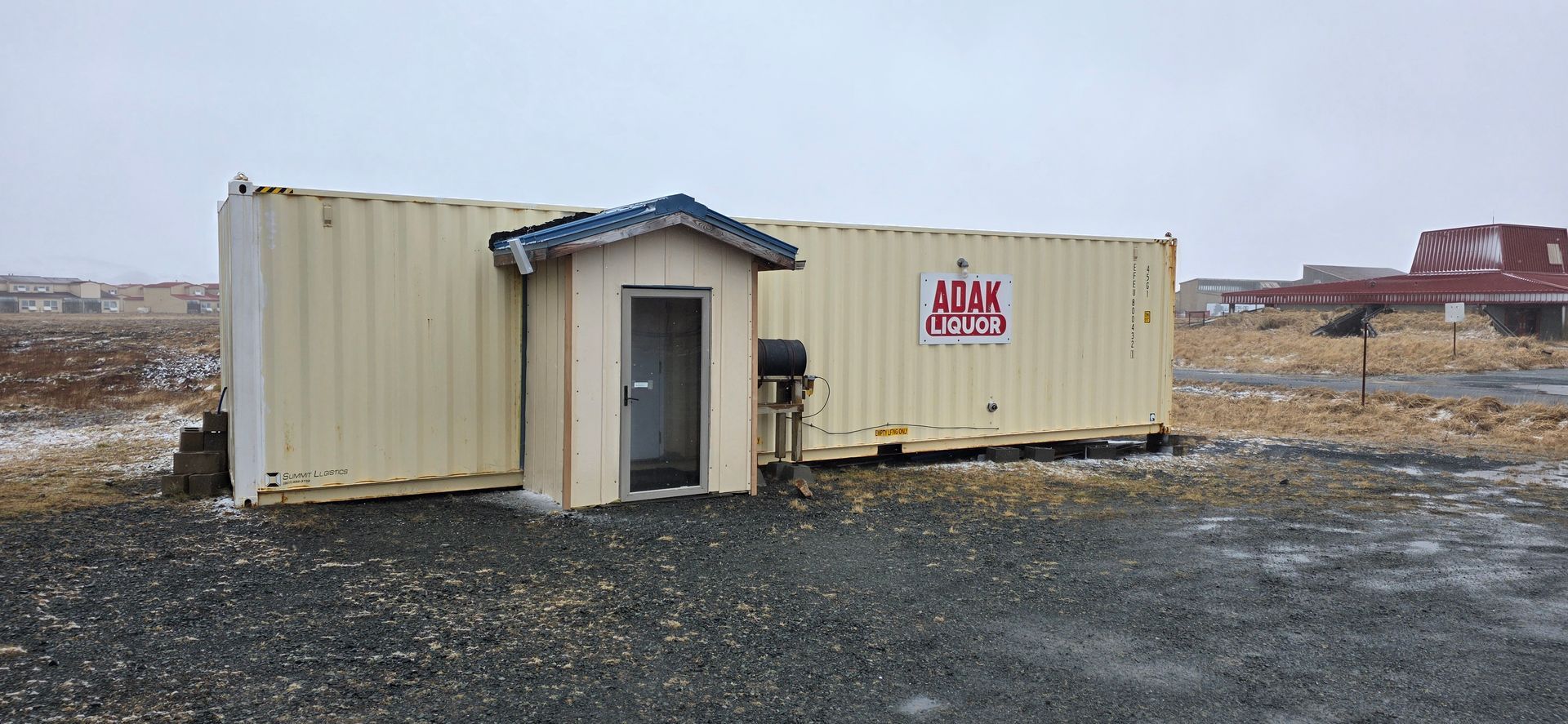 Bobcat T76 compact track loader with a black bucket, on gravel, outdoors.