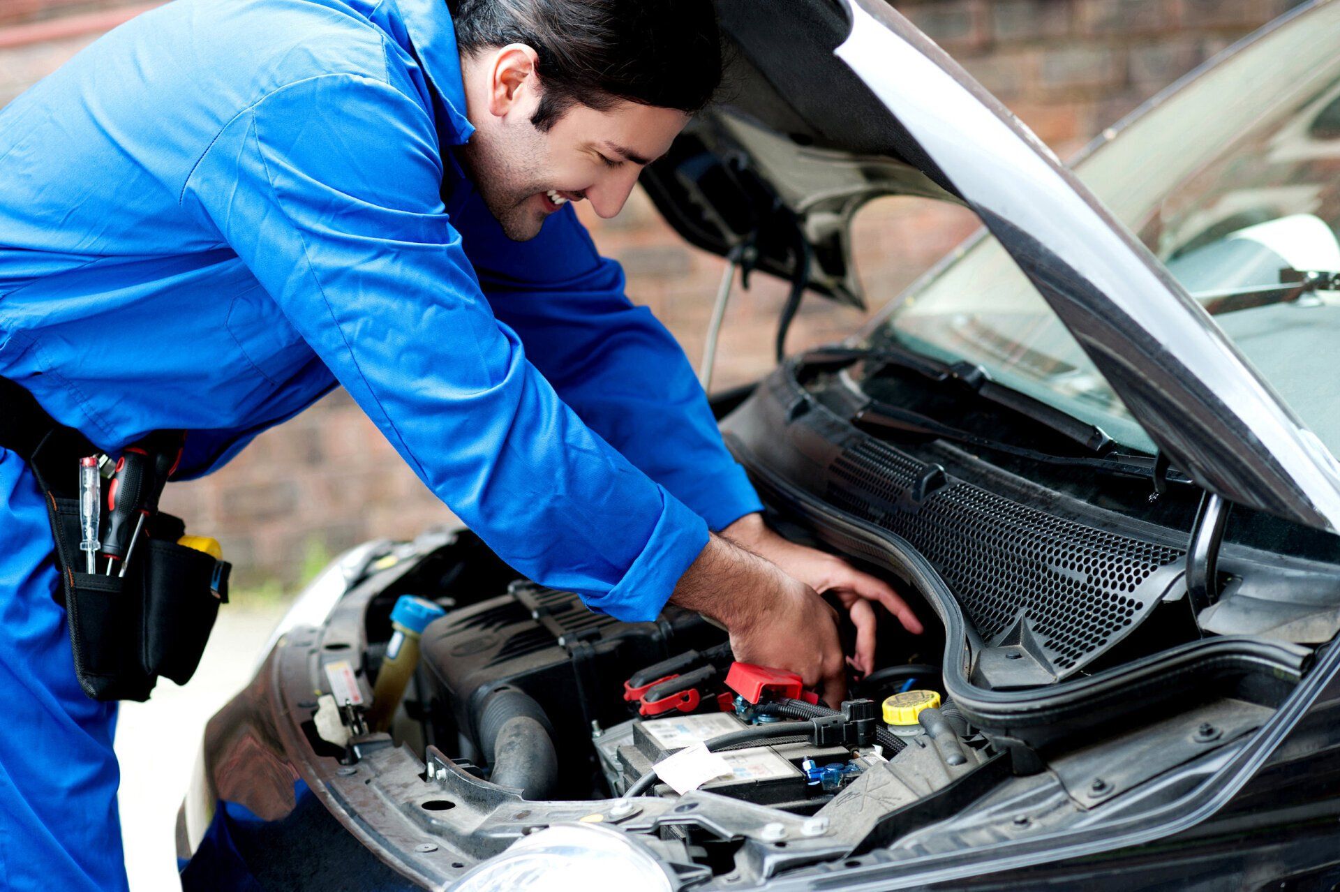 Частичное замена людей. Ремонт машин человек. He is repairing his car. He is repairing his car. He is repairing his car.