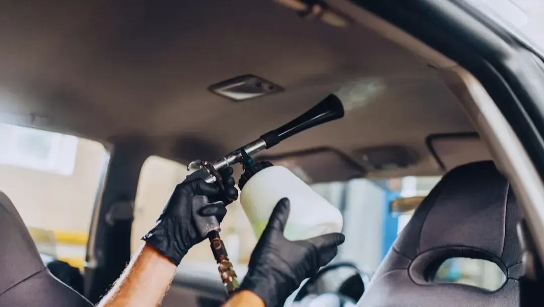 cleaning the roof of the car