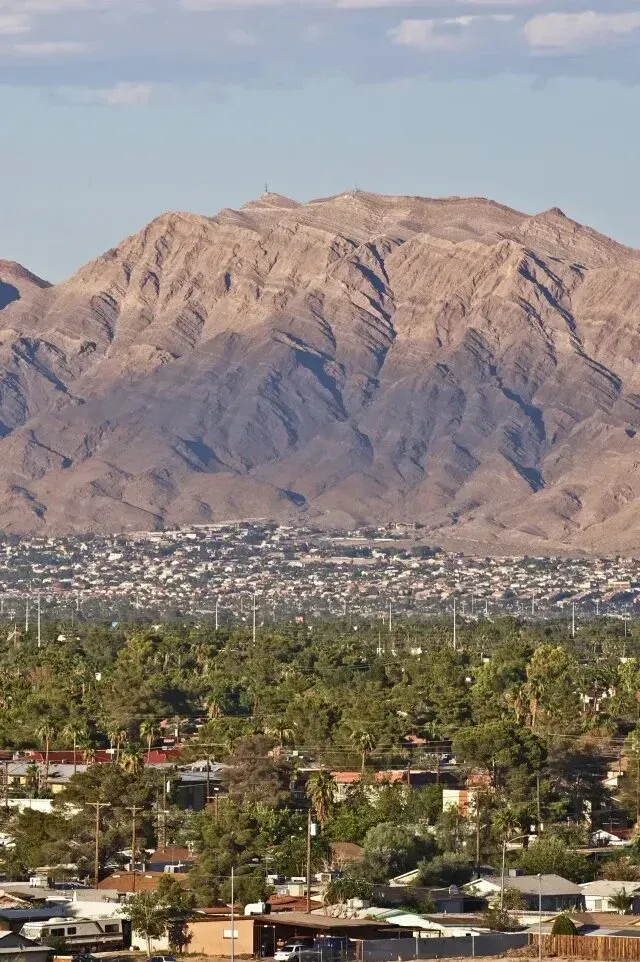 Mobile Detailing - An aerial view of a city with mountains in the background