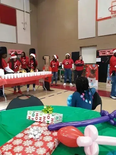 Mobile Detailing-A table with balloons and a sign that says ho ho ho