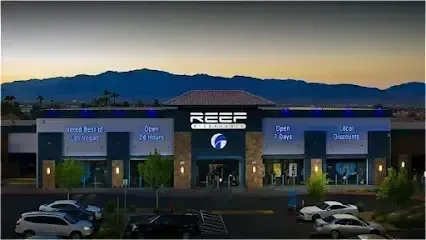 Mobile Detailing-A large building with a lot of cars parked in front of it.