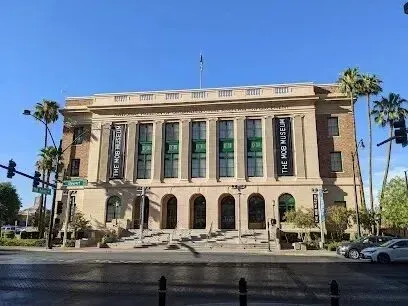 Mobile Detailing-a large building with a sign on the side that says ' the new york '