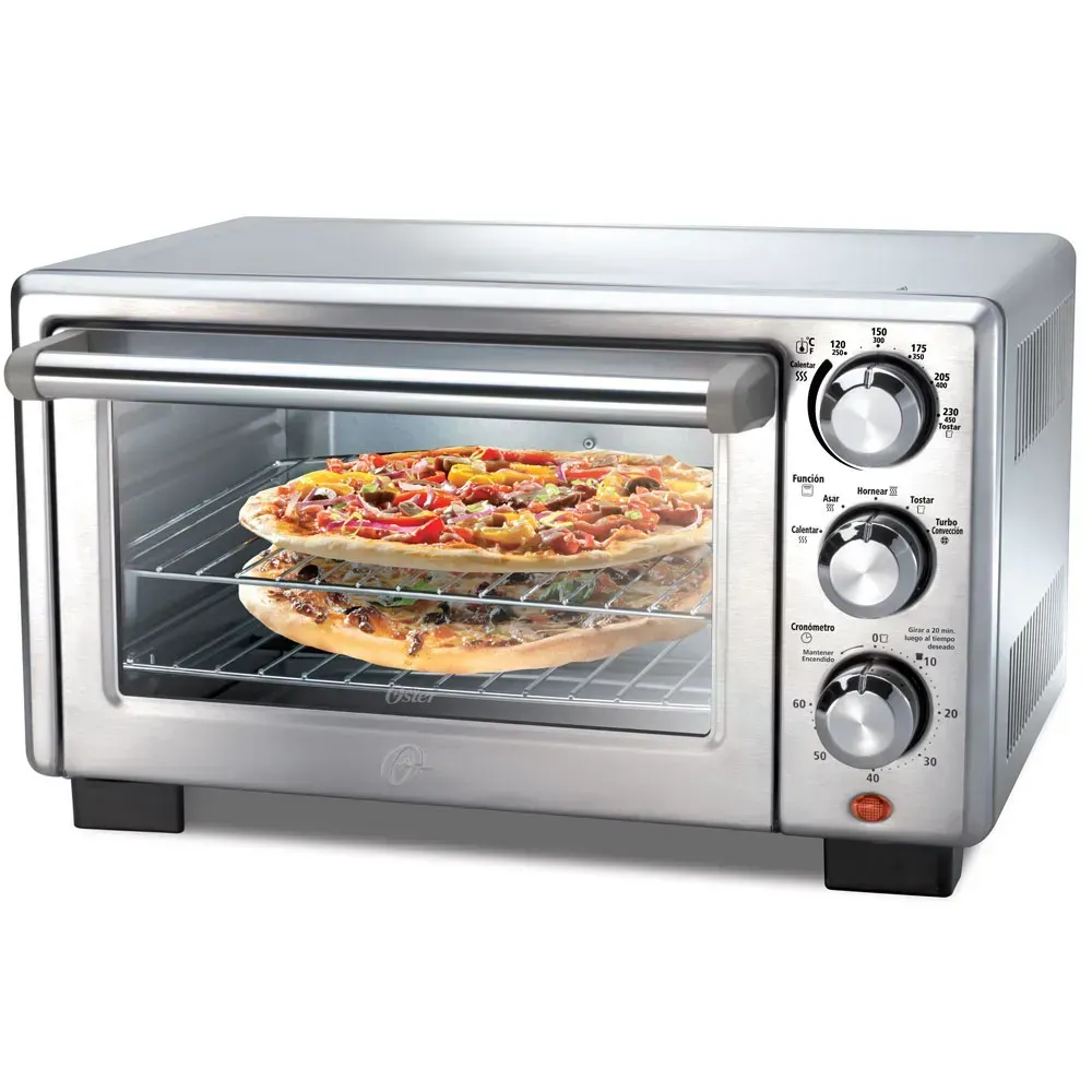 Horno tostador de plata con dos pizzas en su interior, cocinándose.