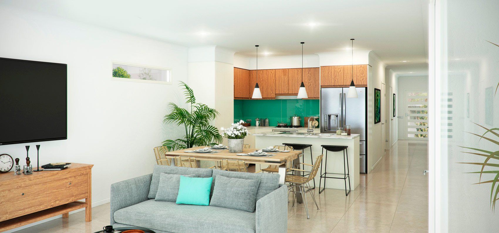 A living room with a couch and a flat screen tv.