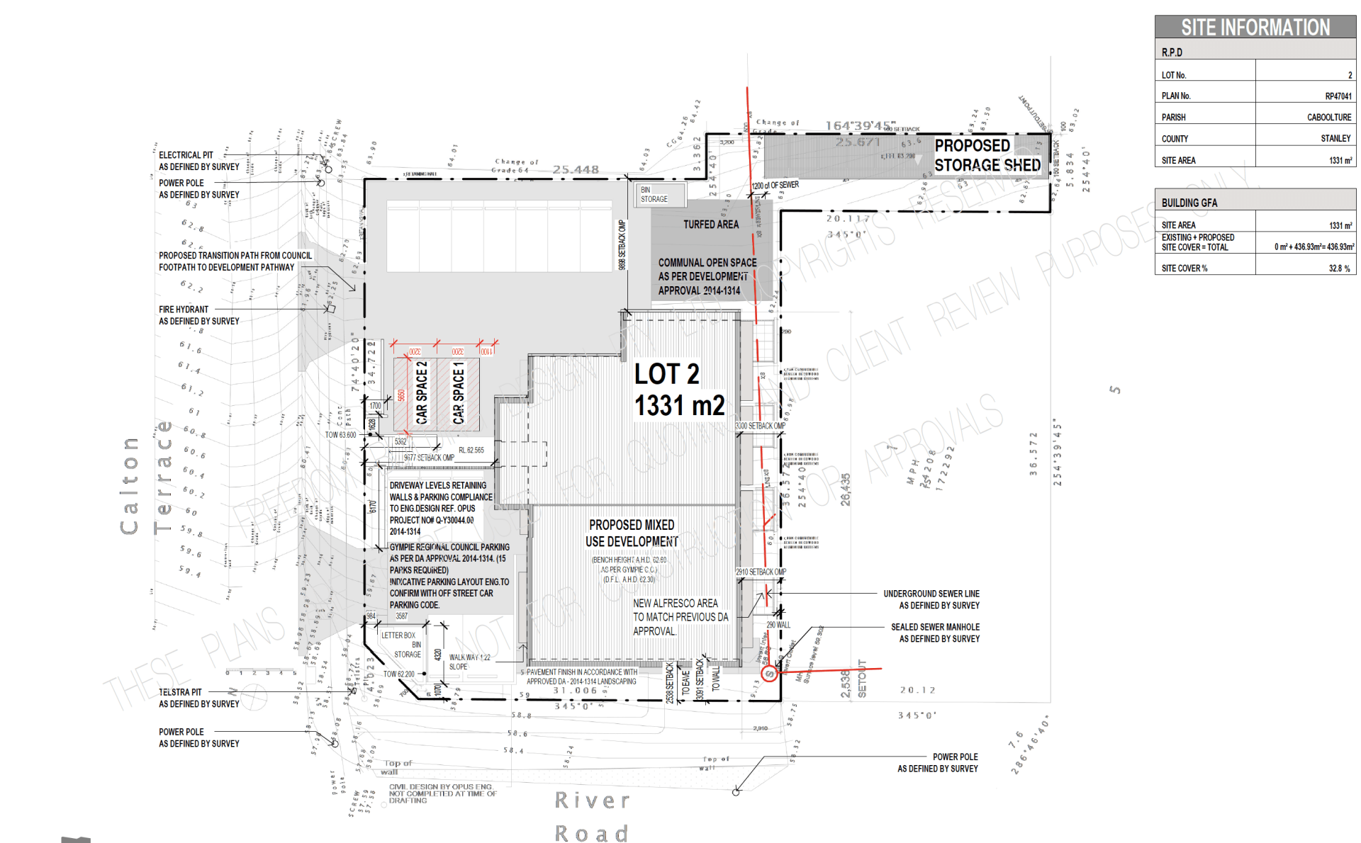 A black and white drawing of a building with lot 2 in the middle.