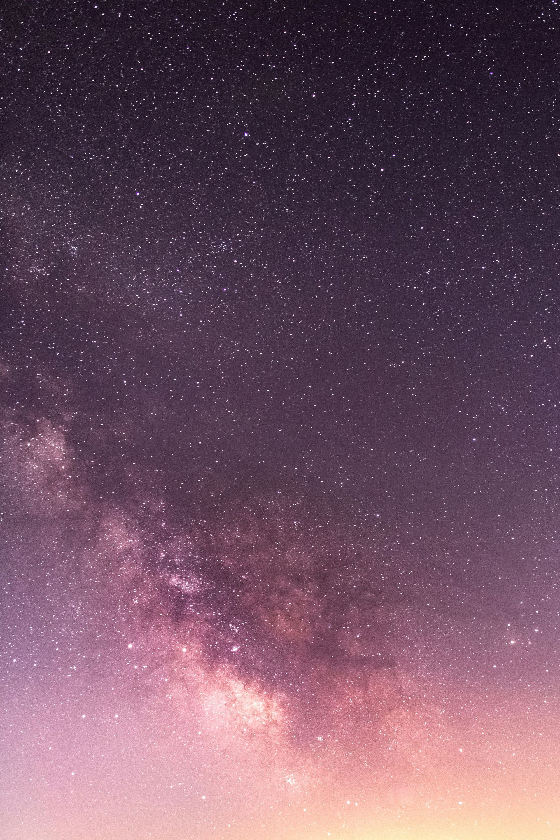The milky way galaxy is visible in the night sky.
