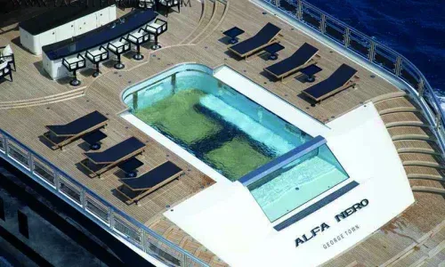 Teakdecking Systems Composite Decking on a yacht's pool deck, designed for durability and elegance in high-traffic areas