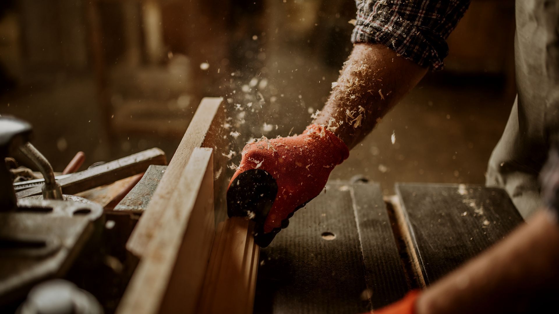 Teakdecking Systems expert craftsman meticulously working in the shop, showcasing skill and dedication to quality