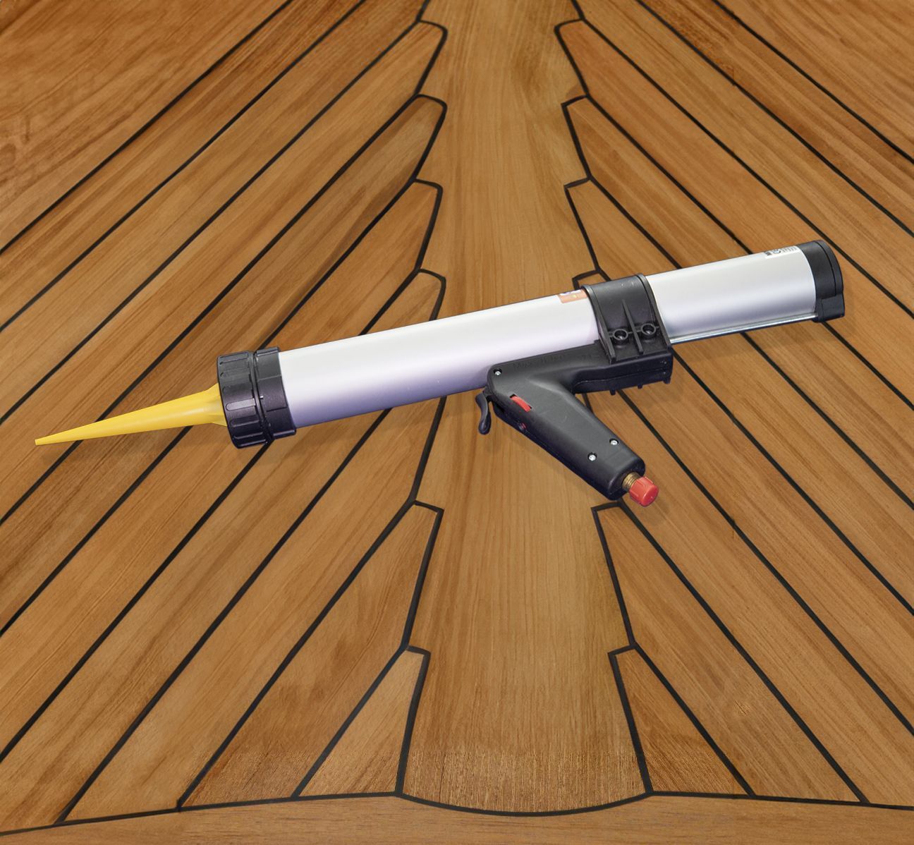 Teakdecking Systems Caulk Sausage Gun: A professional tool for precise application of caulk in marine decking projects