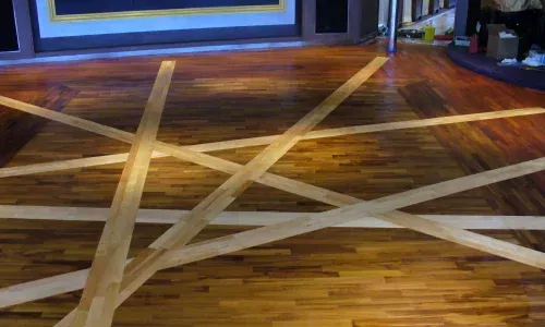 Teakdecking Systems' unique decorative design for a yacht interior, showcasing elegant and custom teak craftsmanship