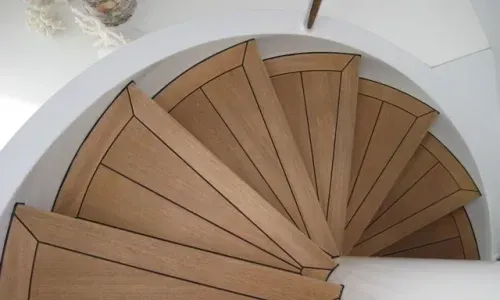 Beautiful yacht staircase by Teakdecking Systems, showcasing elegant design and superior craftsmanship