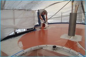 Teakdecking Systems installer expertly fairing a yacht, ensuring a smooth and even surface for top-quality decking