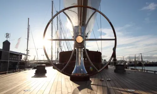 Stunning ship's wheel, showcasing exquisite craftsmanship and timeless nautical design for luxury vessels