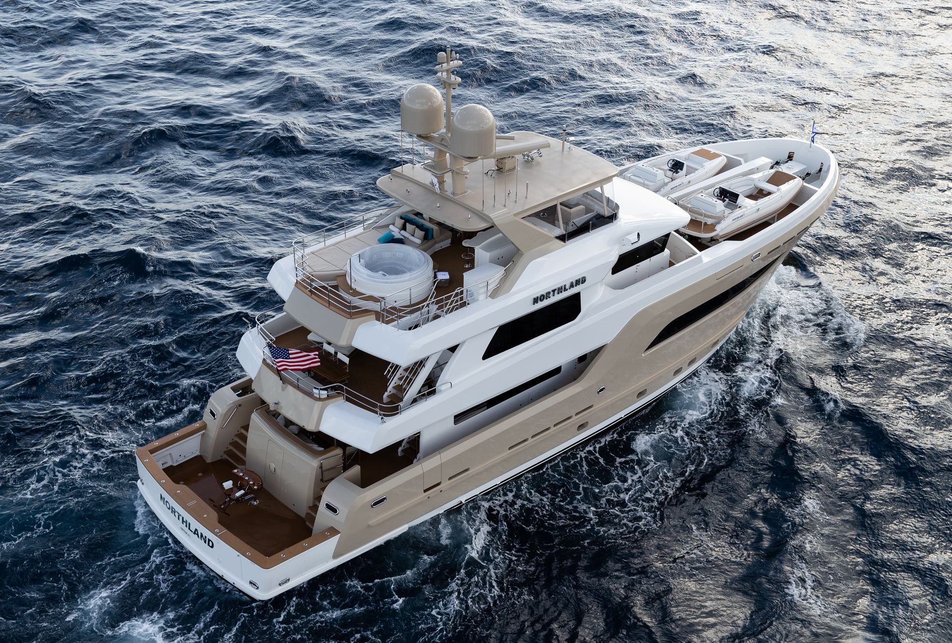 A composite deck by Teakdecking Systems on a Northland boat, showcasing quality craftsmanship and modern design