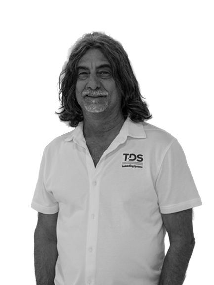 Sal Busacca, 25-year veteran at Teakdecking Systems, oversees teak deck installations and educates clients on project needs.
