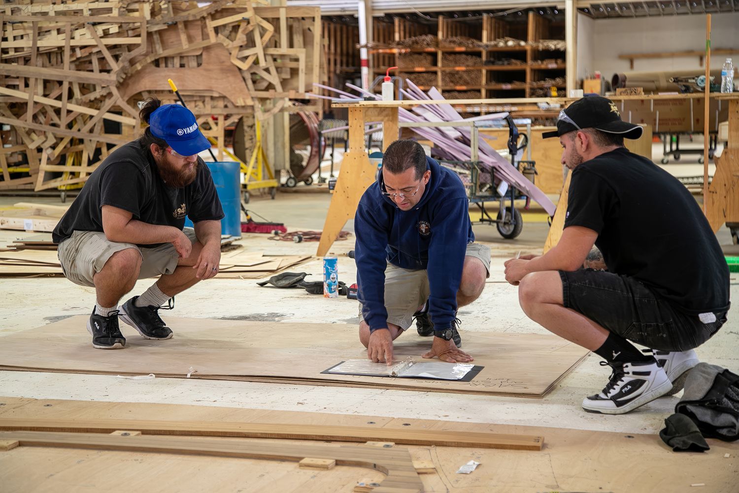 Teakdecking Systems workers in the shop, showcasing skilled craftsmanship and precision, offering great career opportunities