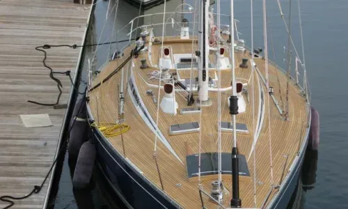 Swan yacht moored, showcasing elegant design and superior craftsmanship, epitomizing luxury and performance on the water