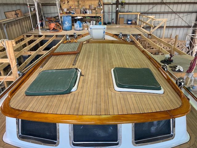 TDS team installs a new teak deck, ensuring precision and quality craftsmanship, conveniently where your boat is located
