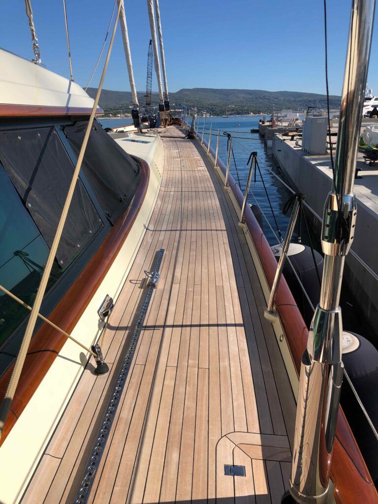 
Teak deck side view, showcasing natural wood grain and premium craftsmanship in marine decking