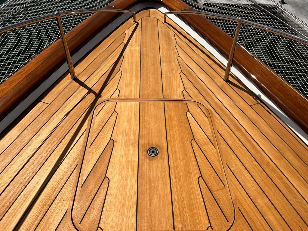 King plank on a teak deck by Teakdecking Systems, showcasing precision craftsmanship and elegant marine design
