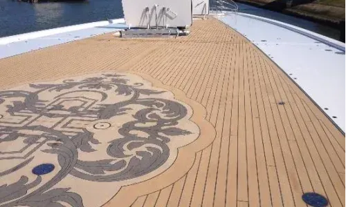 A composite deck showcasing an exquisite custom design, featuring intricate patterns and premium craftsmanship