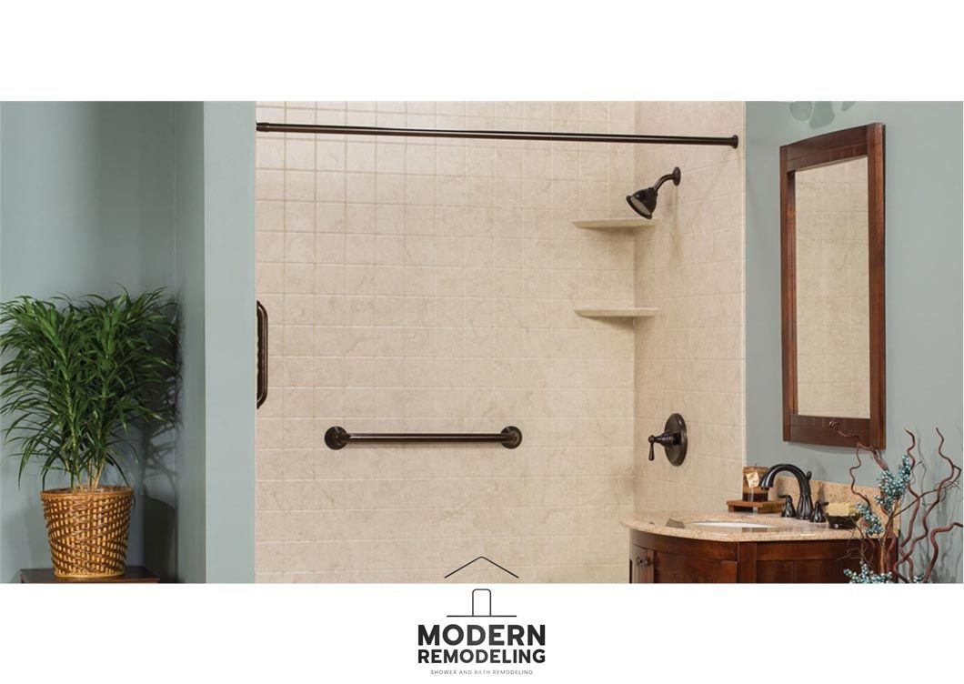 A bathroom with a walk in shower and a sink.