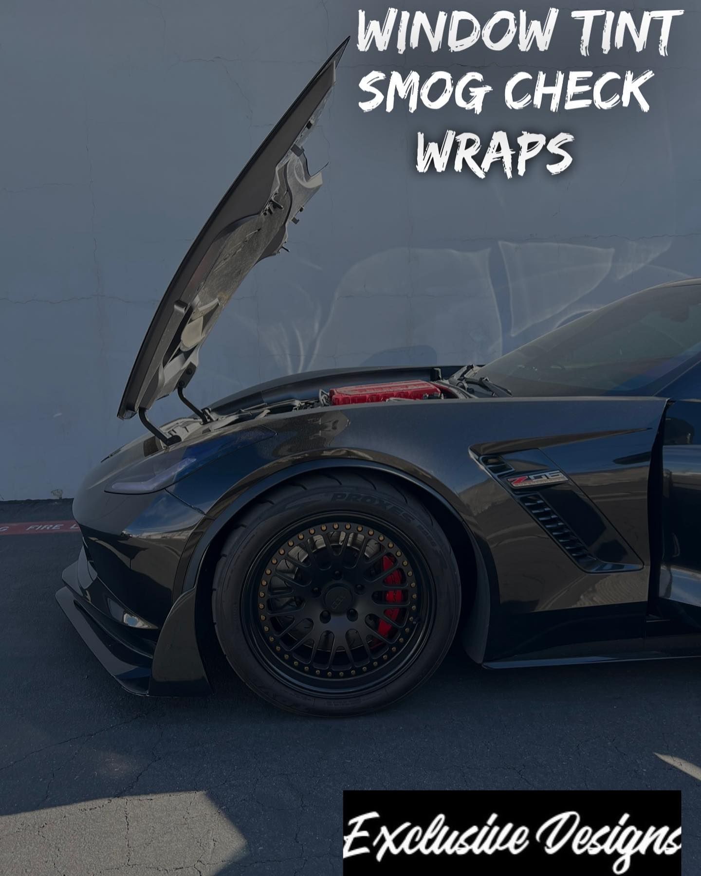 A black sports car with the hood up and the text window tint smog check wraps
