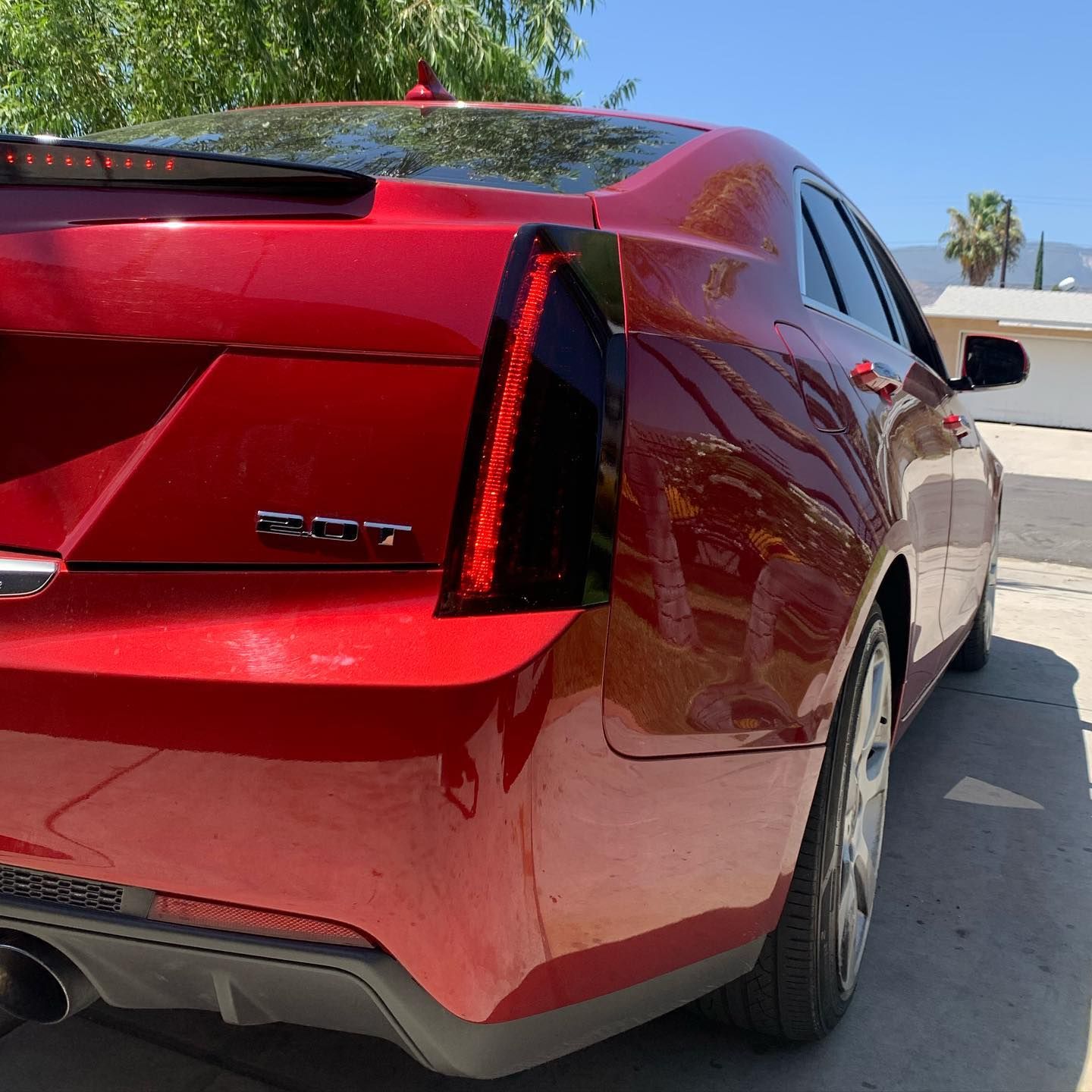 A red car with the word datto on the back
